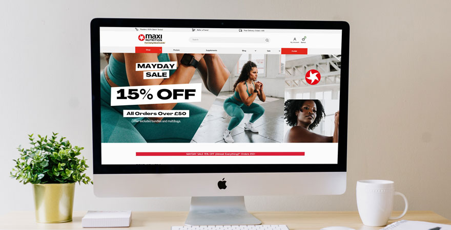 Maxinutrition ecommerce site on iMac