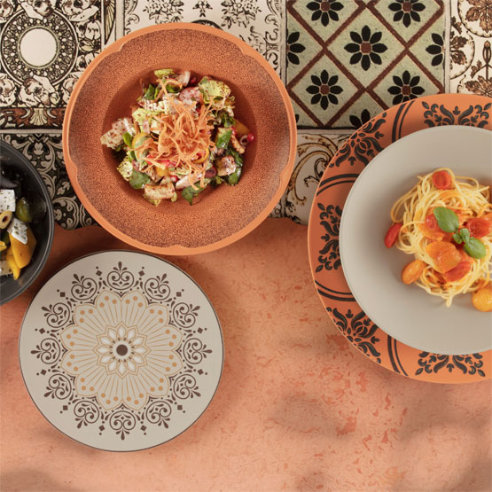 Dishes of food laid out on a table