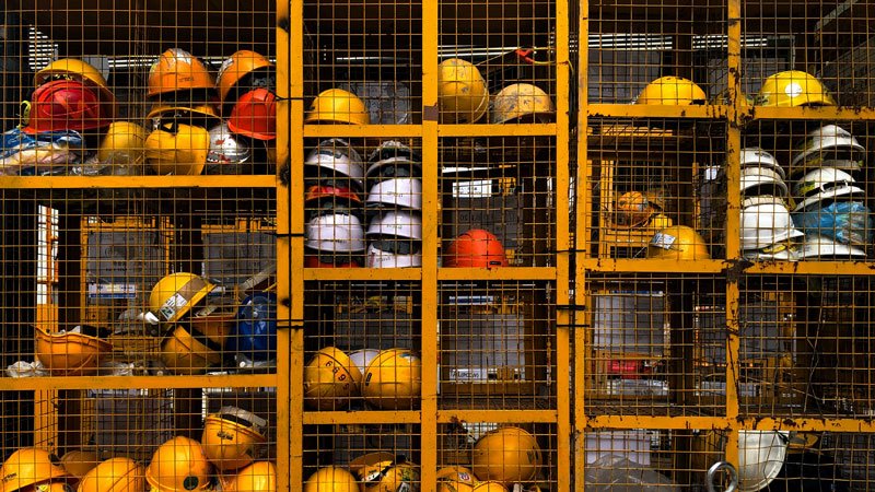 safety hats in cage