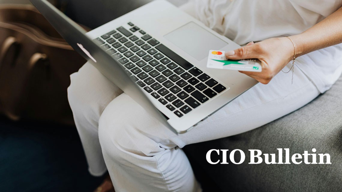 Women with laptop and credit card