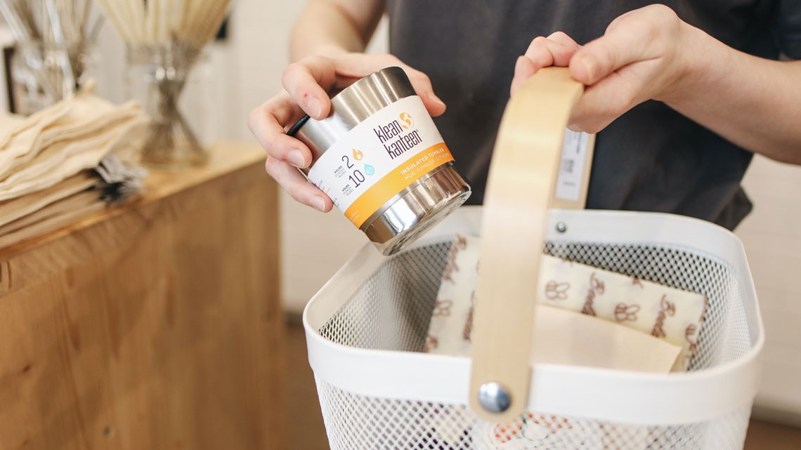 Consumer adding items to shopping basket