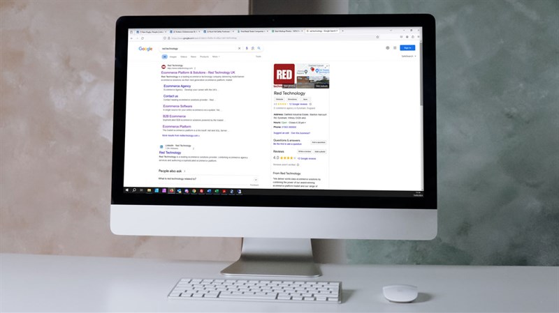 Google search results page for Red Technology showing on screen