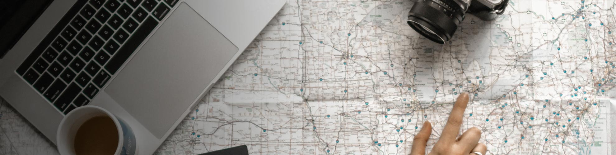 person pointing at map