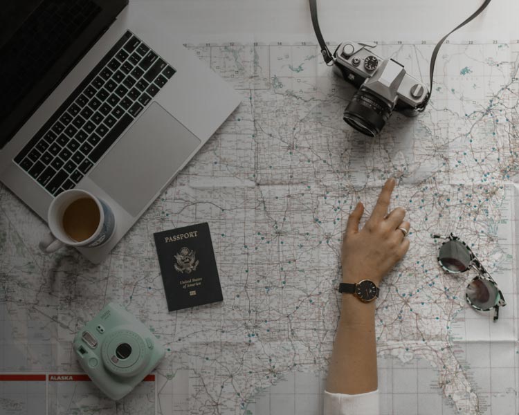 person pointing at map