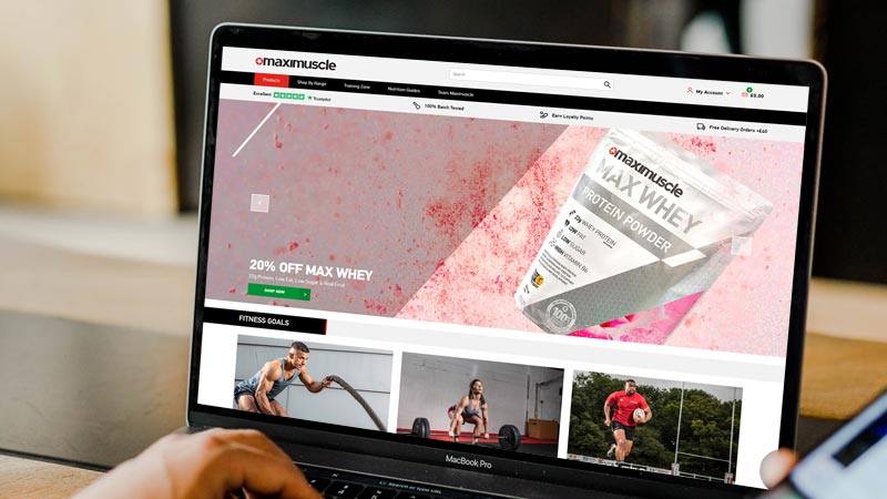 Maximuscle ecommerce site on laptop