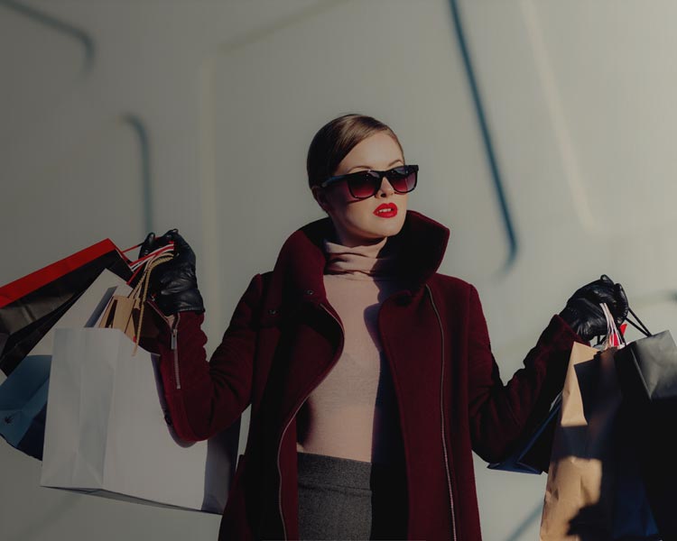 Woman holding bags of shopping