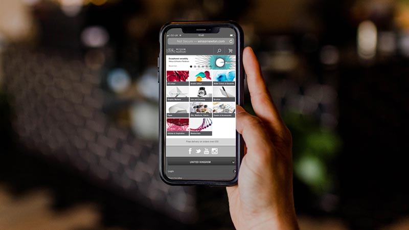 Winsor & Newton ecommerce site on mobile phone